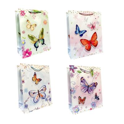 Torebka prezentowa uniwersalna M Motyle mix. Wydawca: JU-PITER. SmakLiter.pl Opakowanie Torebka prezentowa uniwersalna M Motyle mix