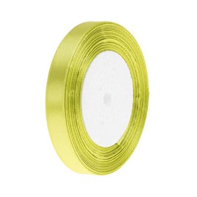 Wstążka satynowa 150 pistacjowy 12mm/32m. Wydawca: Brewis. SmakLiter.pl Opakowanie Wstążka satynowa 150 pistacjowy 12mm/32m