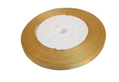 Wstążka satynowa 186 ciemny złoty 6mm/32m. Wydawca: Brewis. SmakLiter.pl Opakowanie Wstążka satynowa 186 ciemny złoty 6mm/32m