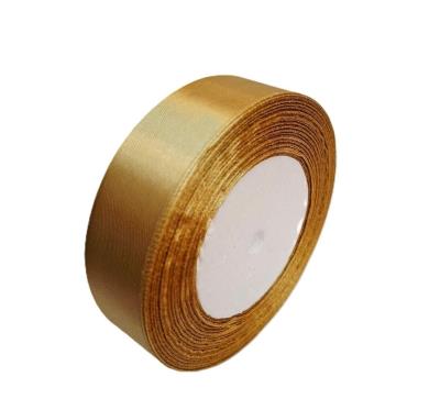 Wstążka satynowa 186 złoty ciemny 25mm/32m. Wydawca: Brewis. SmakLiter.pl Opakowanie Wstążka satynowa 186 złoty ciemny 25mm/32m
