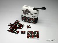 Trax gra logiczna 64 płytki nr. kat TRX. Wydawca: Grapet. SmakLiter.pl Opakowanie Trax gra logiczna 64 płytki nr. kat TRX