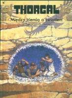 Thorgal T.13 Między ziemią a światłem. Autor: Jean Van Hamme. SmakLiter.pl Okładka książki Thorgal T.13 Między ziemią a światłem