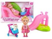 Lalka Natalia z pieskiem na placu zabaw 10cm. Wydawca: Artyk. SmakLiter.pl Opakowanie Lalka Natalia z pieskiem na placu zabaw 10cm