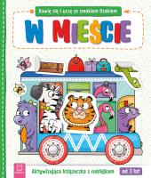 Okładka książki Bawię się i uczę ze smokiem Dżokiem. W mieście. Aktywizująca książeczka z naklejkami od 3 lat