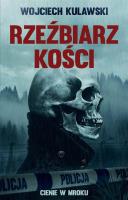Cienie w mroku T.1 Rzeźbiarz kości. Autor: Wojciech Kulawski. SmakLiter.pl Okładka książki Cienie w mroku T.1 Rzeźbiarz kości