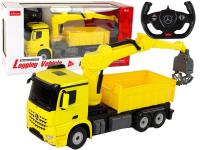Ciężarówka z chwytakiem R/C Mercedes żółta. Wydawca: Rastar. SmakLiter.pl Opakowanie Ciężarówka z chwytakiem R/C Mercedes żółta