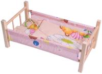 Łóżeczko drewniane dla lalki z pościelą MIX. Wydawca: MALIMAS. SmakLiter.pl Opakowanie Łóżeczko drewniane dla lalki z pościelą MIX