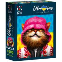 Puzzle 1000 Uśmiechnięty kot w różowej czapce DT1000-07. Wydawca: De.tail. SmakLiter.pl Opakowanie Puzzle 1000 Uśmiechnięty kot w różowej czapce DT1000-07