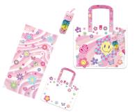 Ręcznik plażowy w torbie kwiatki. Wydawca: POCOWARE. SmakLiter.pl Opakowanie Ręcznik plażowy w torbie kwiatki