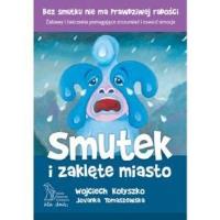 Smutek i zaklęte miasto wyd. 2023. Autor: Wojciech Kołyszko, Jovanka Tomaszewska. SmakLiter.pl Okładka książki Smutek i zaklęte miasto wyd. 2023