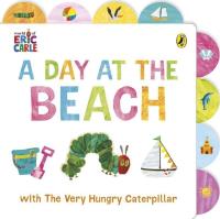A Day at the Beach with The Very Hungry Caterpillar. Autor: Carle Eric. SmakLiter.pl Okładka książki A Day at the Beach with The Very Hungry Caterpillar