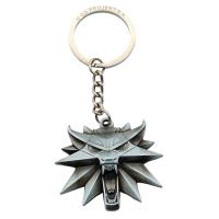 Brelok The Witcher Wiedźmin Wolf Medallion. Wydawca: GOOD LOOT. SmakLiter.pl Opakowanie Brelok The Witcher Wiedźmin Wolf Medallion