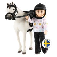 Lalka dżokejka zestaw z koniem. Wydawca: MICKI. SmakLiter.pl Opakowanie Lalka dżokejka zestaw z koniem