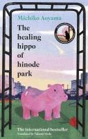 The Healing Hippo Of Hinode Park wer. angielska. Autor: Aoyama Michiko. SmakLiter.pl Okładka książki The Healing Hippo Of Hinode Park wer. angielska