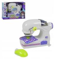 Zestaw maszyna do szycia 6994A. Wydawca: Maksik. SmakLiter.pl Opakowanie Zestaw maszyna do szycia 6994A